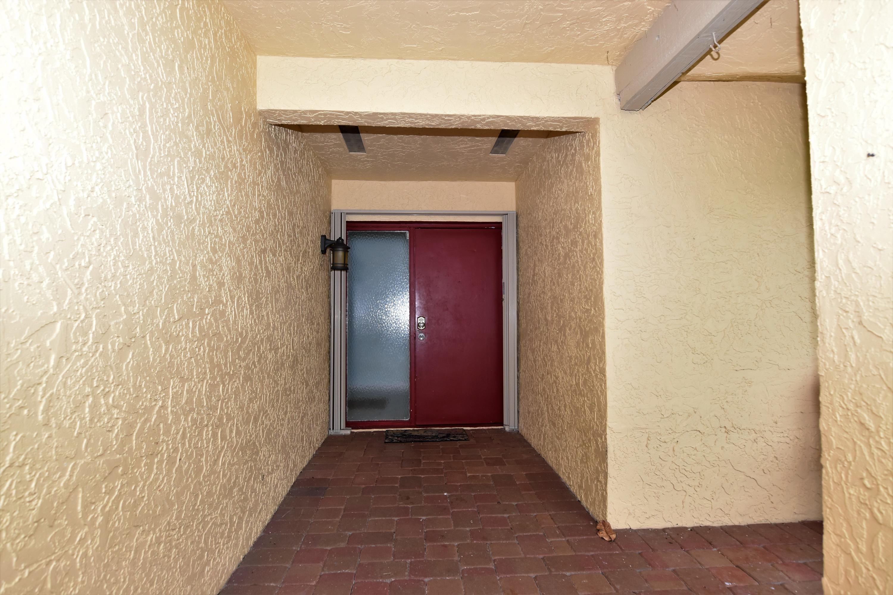 2418 Northwest 29th Road Boca Raton, FL 33431 - Photo 4 of 57 Front Entrance
