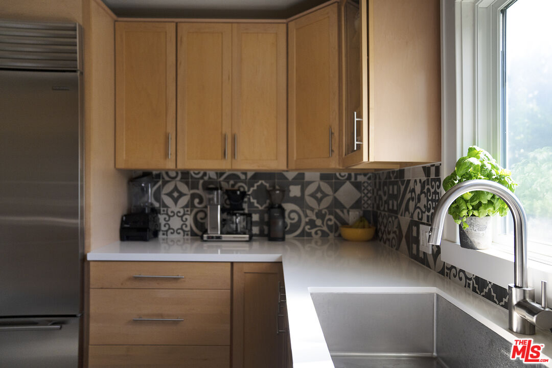 1601 Hi Point Street Los Angeles, CA 90035 - Photo 11 of 25 a kitchen with a window