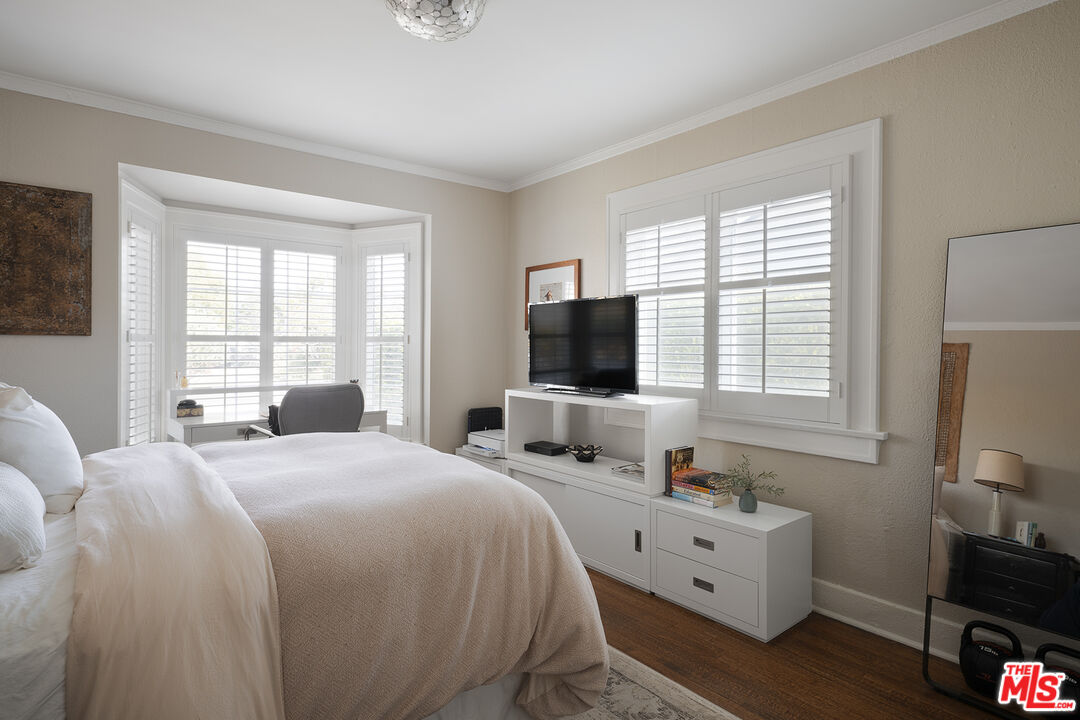 1601 Hi Point Street Los Angeles, CA 90035 - Photo 18 of 25 a view of bedroom with natural light and window
