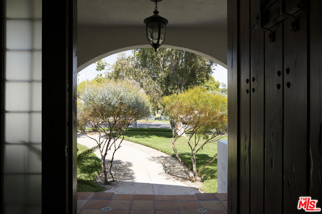 1601 Hi Point Street Los Angeles, CA 90035 - Photo 3 of 25 a view of a porch in a room with a large window