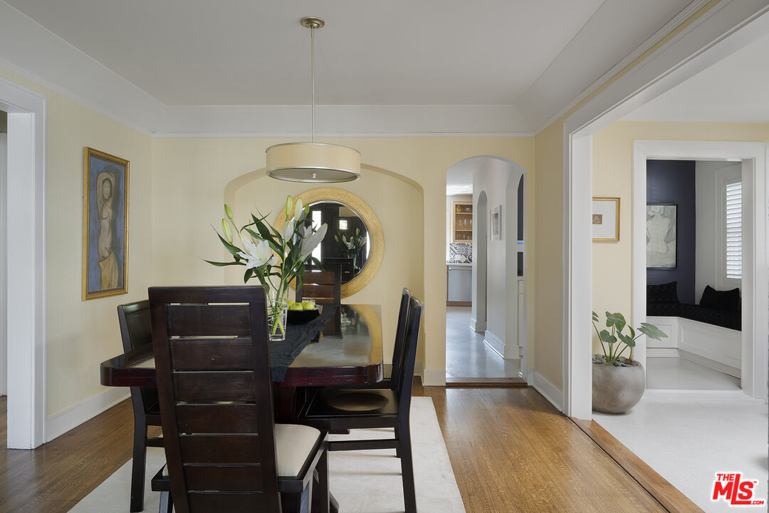 1601 Hi Point Street Los Angeles, CA 90035 - Photo 8 of 25 a dining room with furniture and wooden floor