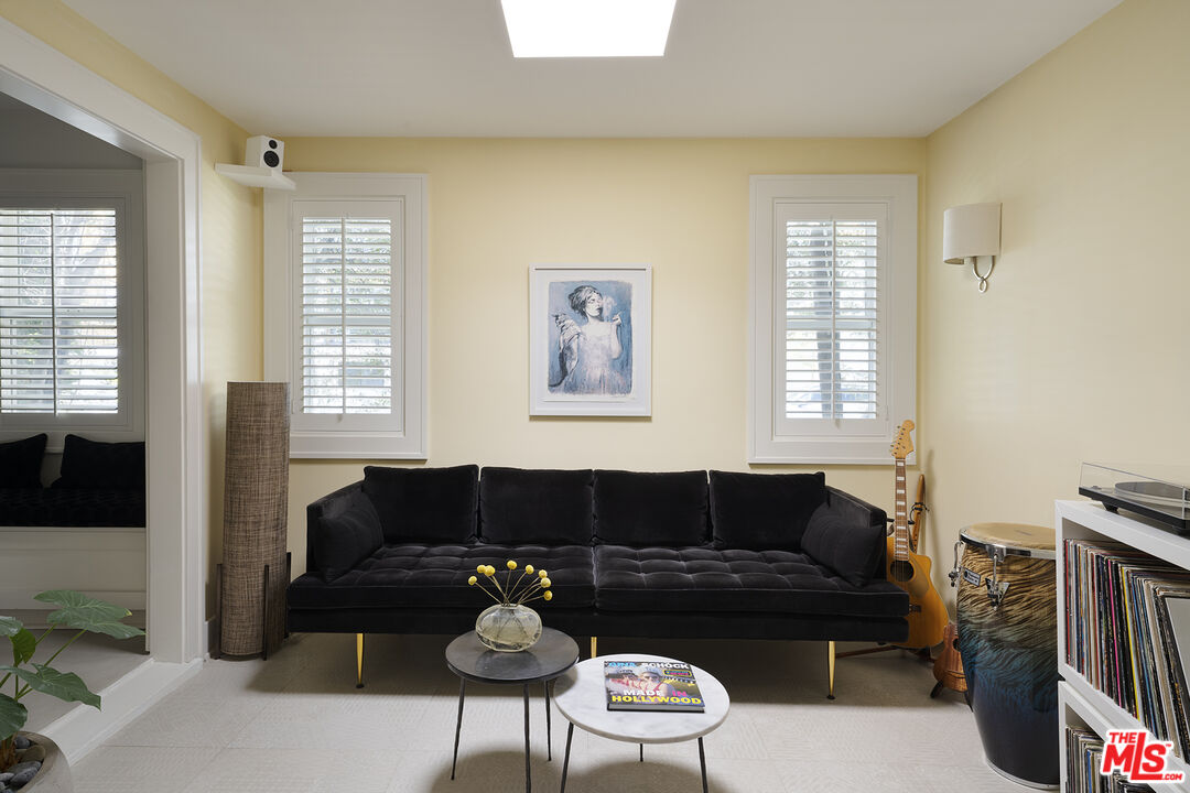 1601 Hi Point Street Los Angeles, CA 90035 - Photo 9 of 25 a living room with furniture and a window