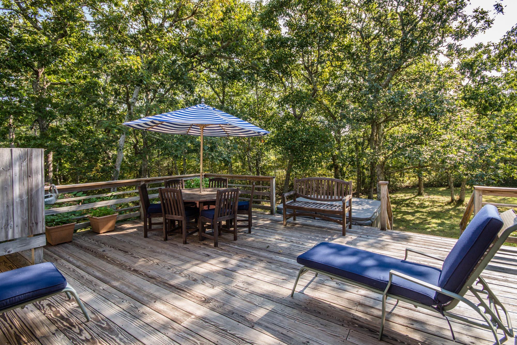 321 Chappaquiddick Road Edgartown, MA 02539 - Photo 11 of 35 a view of a deck with furniture