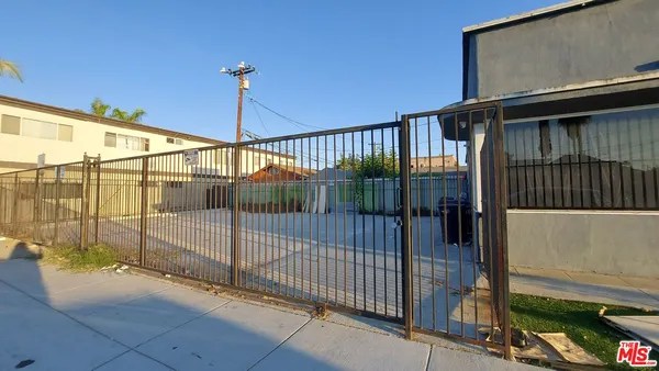 a view of a balcony with glass door