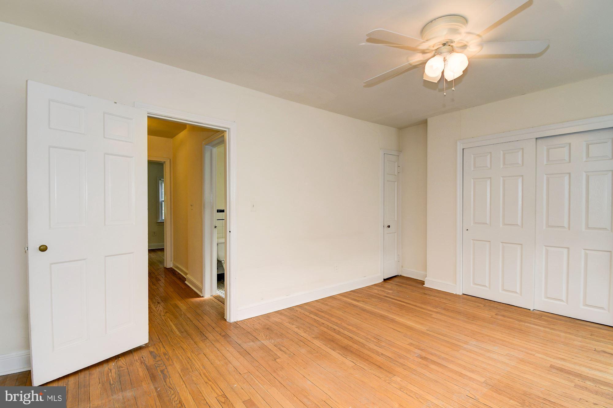1218 Portner Road Alexandria, VA 22314 - Photo 9 of 31 a view of empty room with wooden floor