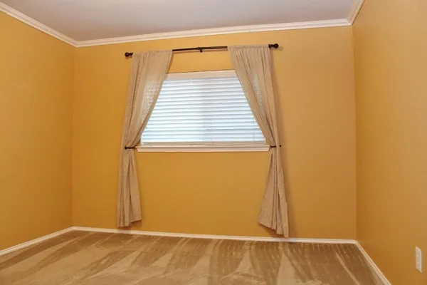 a bathroom with a toilet and shower