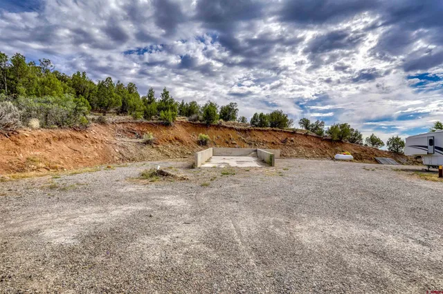 a view of outdoor space with playground and green space