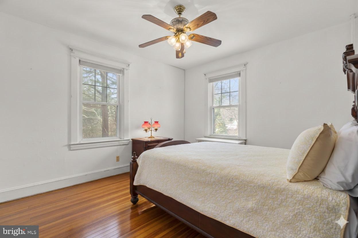 6100 Frederick Road Catonsville, MD 21228 - Photo 22 of 61 a bedroom with a bed and a window