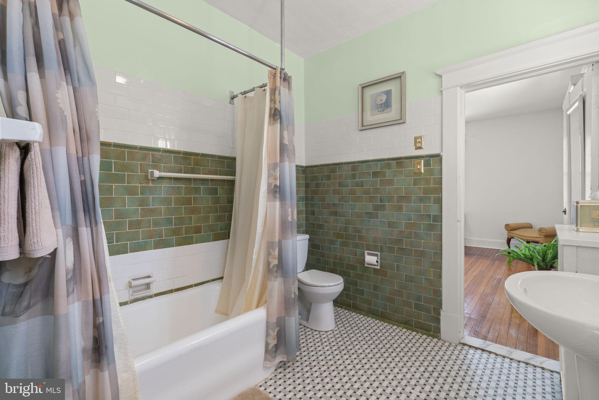 6100 Frederick Road Catonsville, MD 21228 - Photo 33 of 61 a bathroom with a toilet and a shower