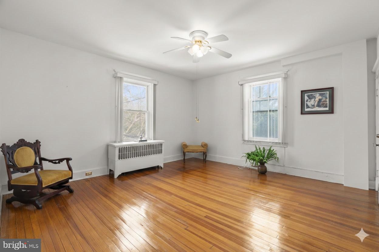 6100 Frederick Road Catonsville, MD 21228 - Photo 35 of 61 a living room with furniture and a wooden floor