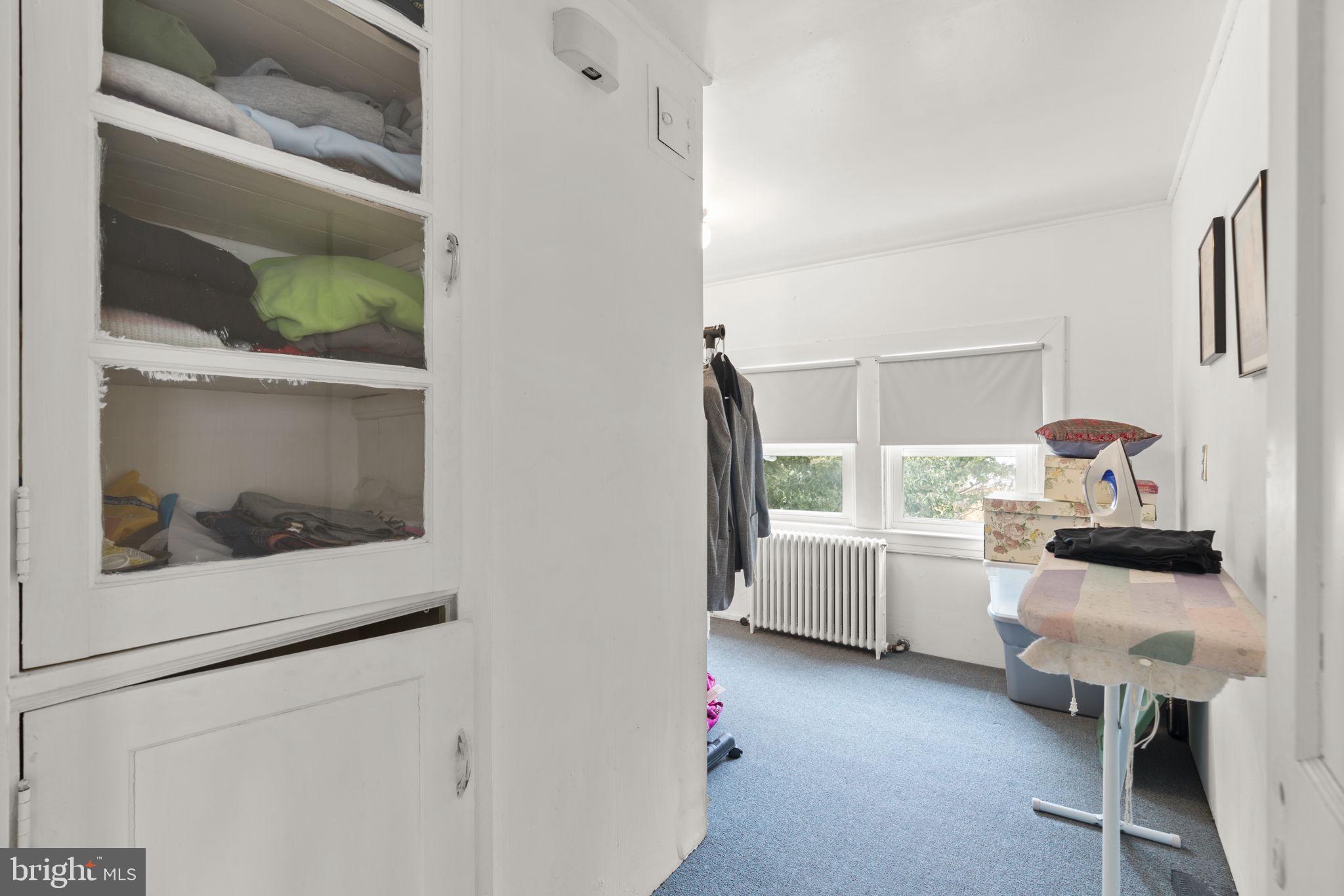 6100 Frederick Road Catonsville, MD 21228 - Photo 44 of 61 a kitchen with a stove and a microwave