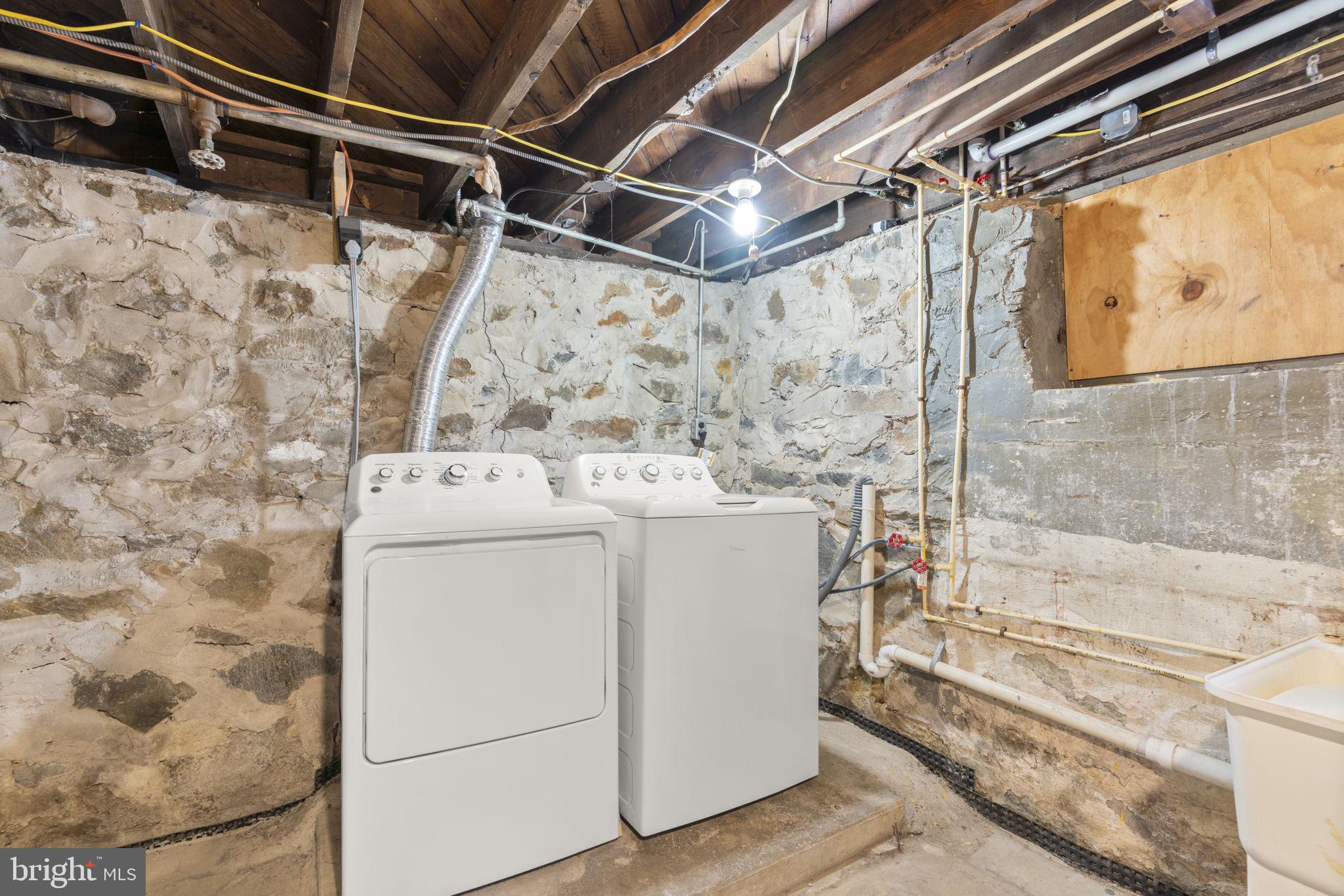 6100 Frederick Road Catonsville, MD 21228 - Photo 46 of 61 a utility room with a washer and dryer