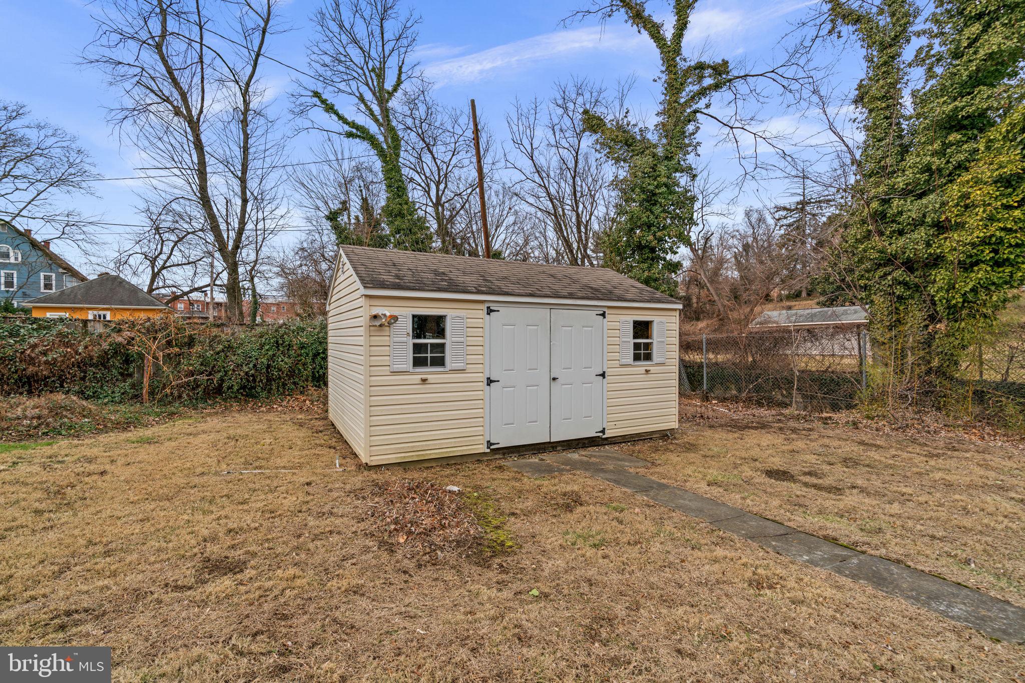 6100 Frederick Road Catonsville, MD 21228 - Photo 53 of 61 a view of a house with a yard