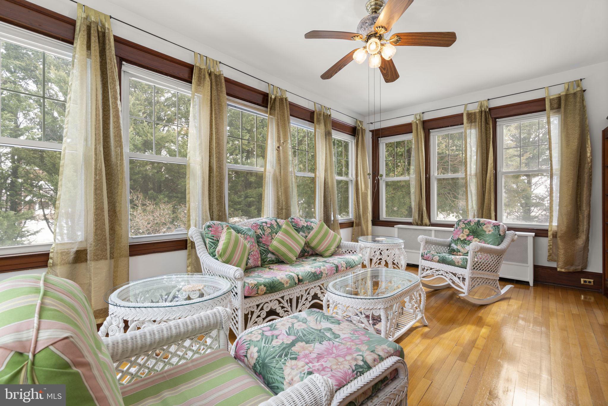6100 Frederick Road Catonsville, MD 21228 - Photo 9 of 61 a living room with furniture and a large window