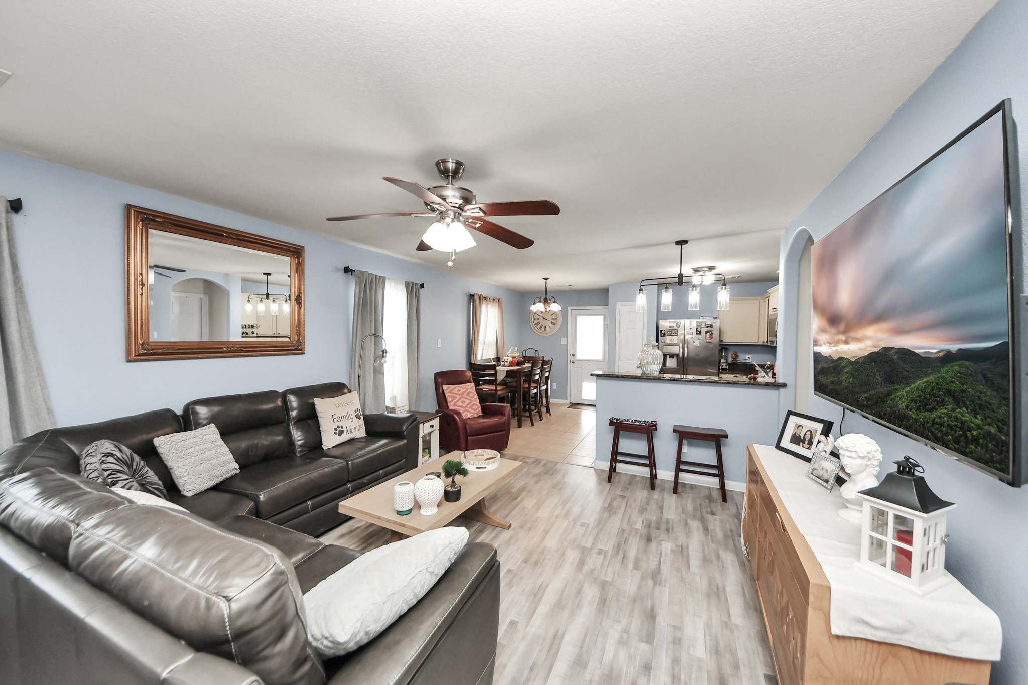28961 San Bernard River Loop Spring, TX 77386 - Photo 12 of 36 a living room with furniture and a flat screen tv