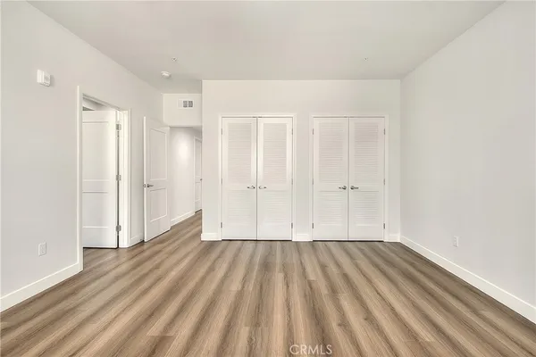 a view of room with hardwood floor