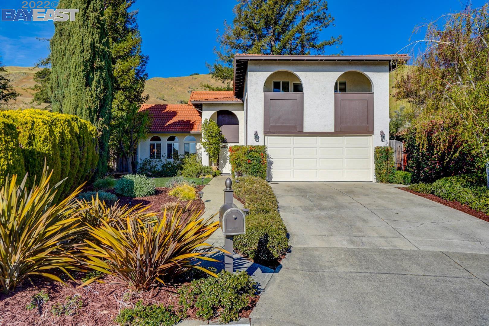 40338 Loro Place Fremont, CA 94539 - Photo 1 of 1 a front view of a house with a yard