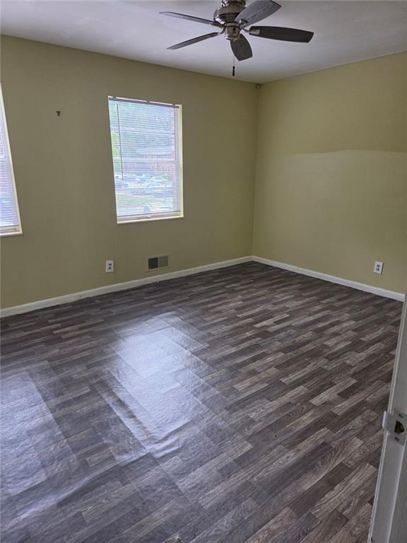 510 Coventry Road, Unit 3A Decatur, GA 30030 - Photo 10 of 24 a view of an empty room with a window and wooden floor