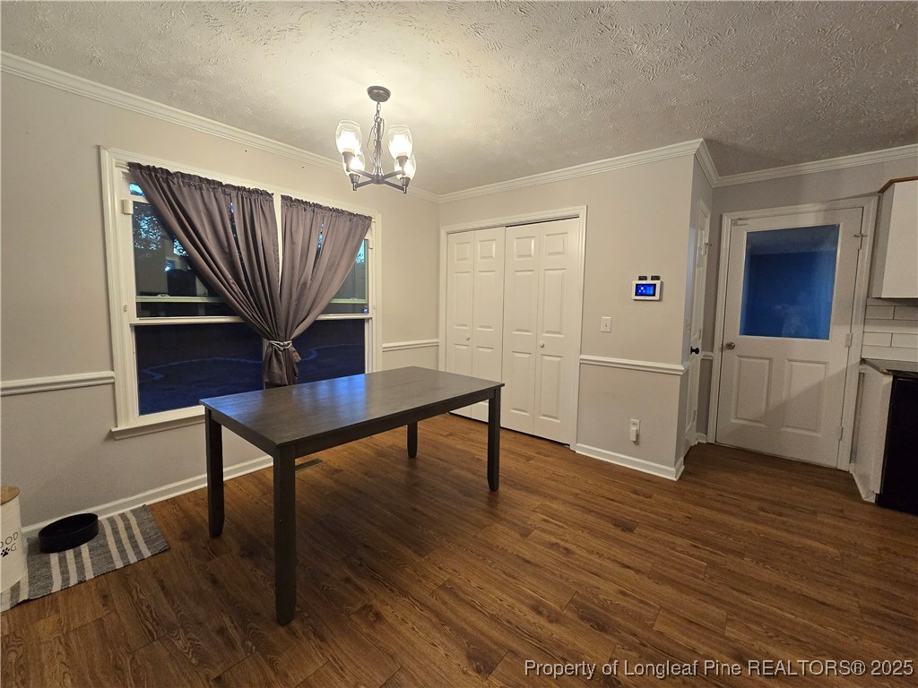 944 Flintwood Road Fayetteville, NC 28314 - Photo 14 of 24 a view of a livingroom with furniture and wooden floor
