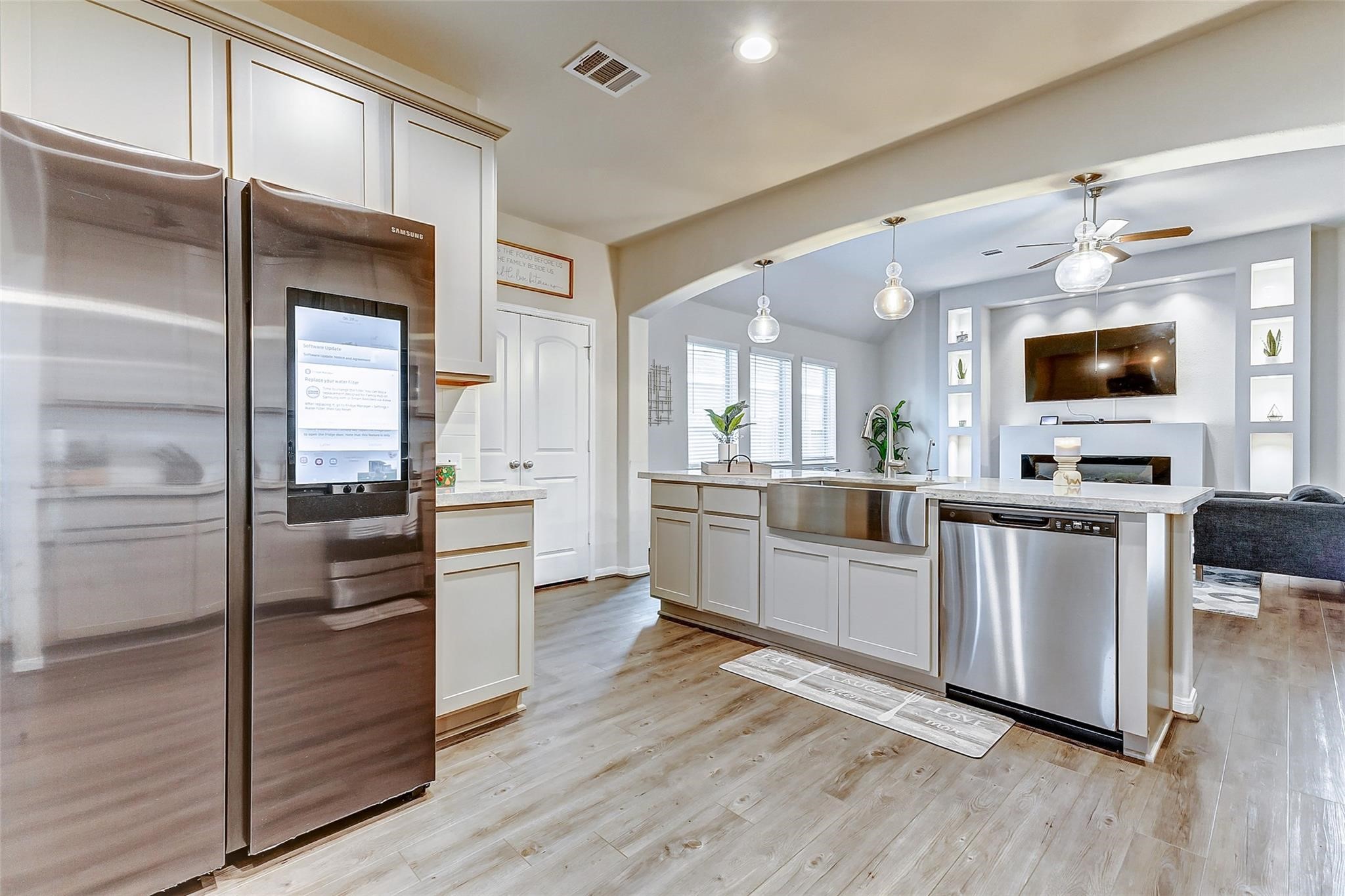 15210 Ordie Run Drive Humble, TX 77346 - Photo 14 of 40 a kitchen with a refrigerator and a stove top oven