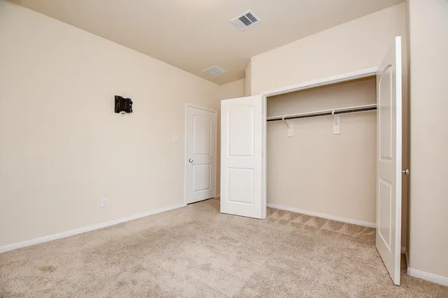 a view of a bathroom with a sink mirror and a bathtub