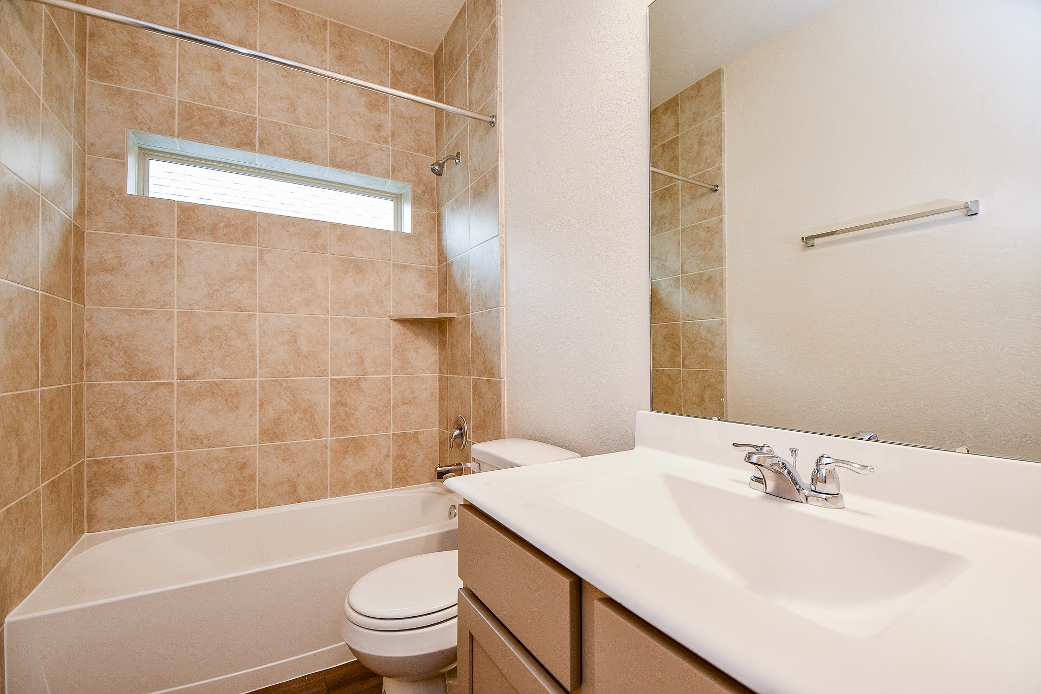15210 Ordie Run Drive Humble, TX 77346 - Photo 20 of 40 a bathroom with a sink a toilet and a bathtub