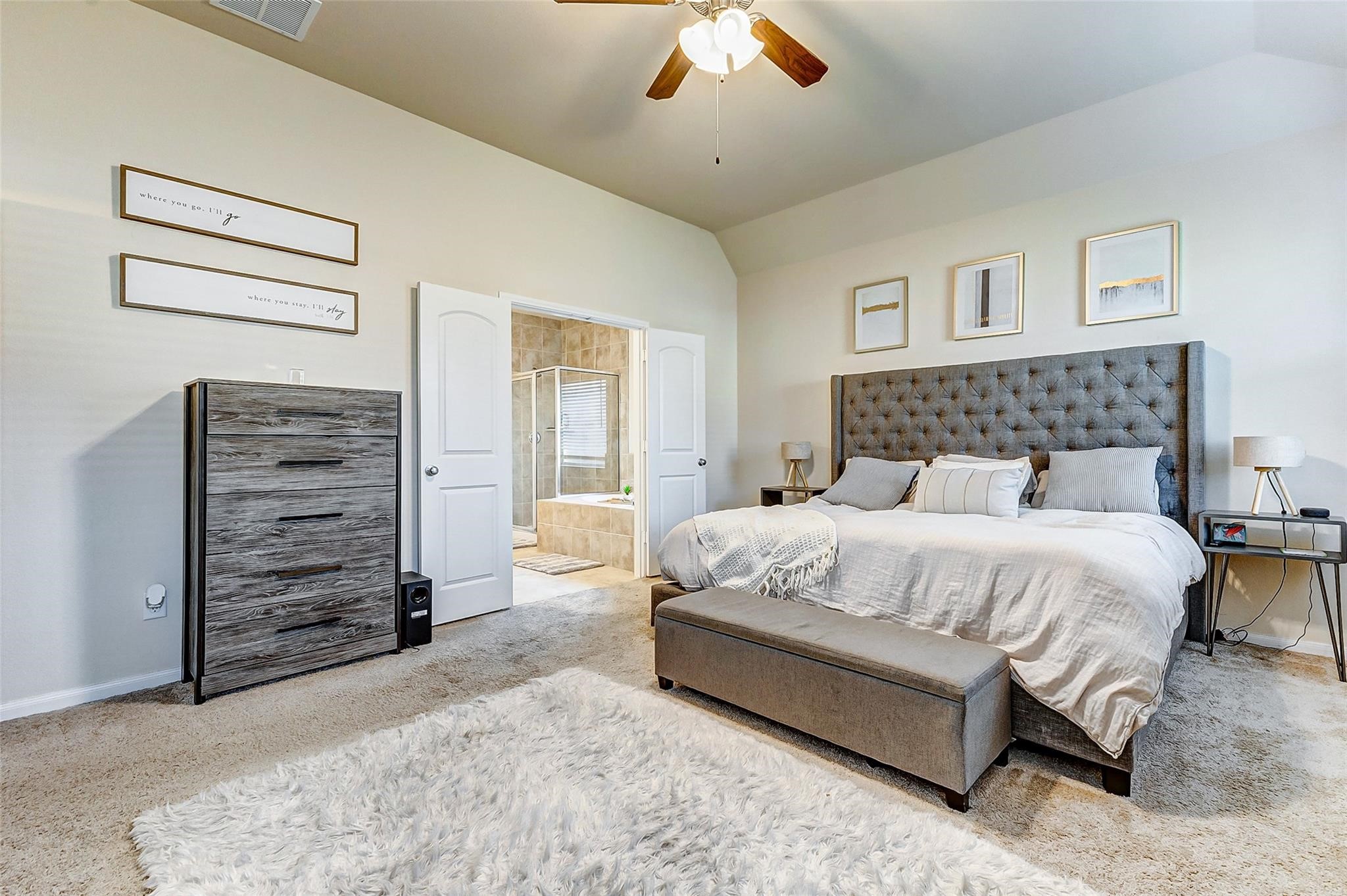 15210 Ordie Run Drive Humble, TX 77346 - Photo 25 of 40 a bedroom with a bed and a couch