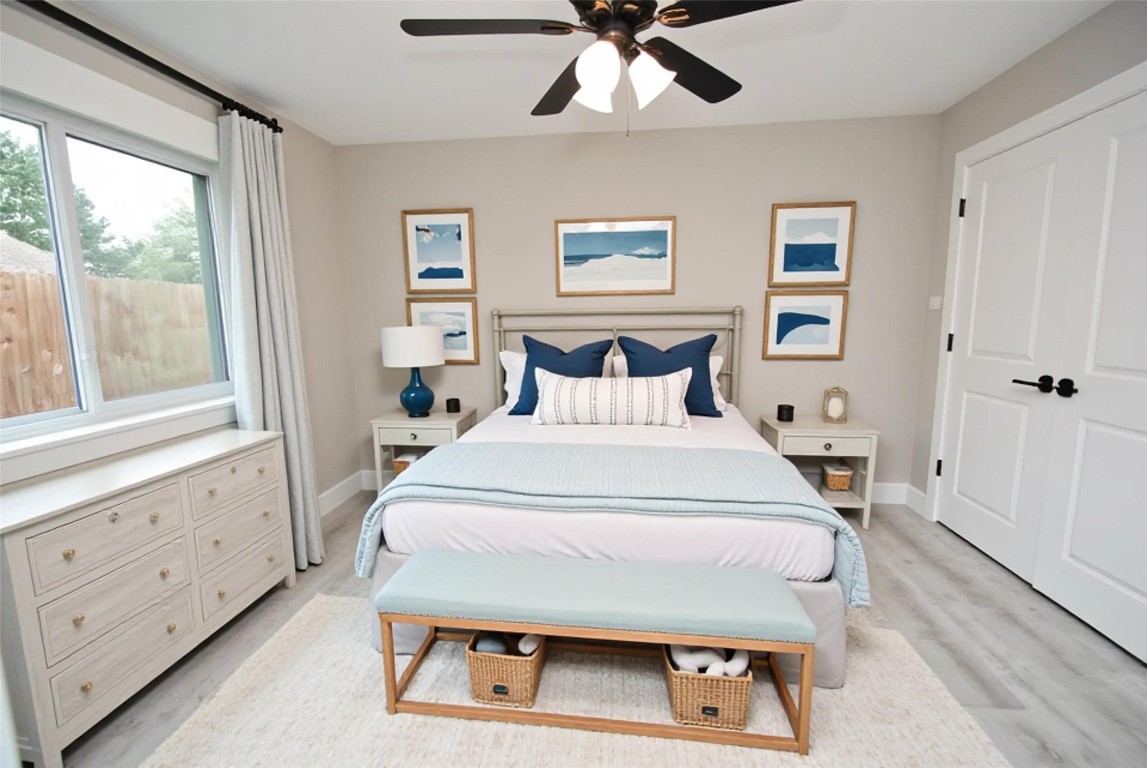 3322 Robinson Road Missouri City, TX 77459 - Photo 12 of 27 a bedroom with a bed and a window