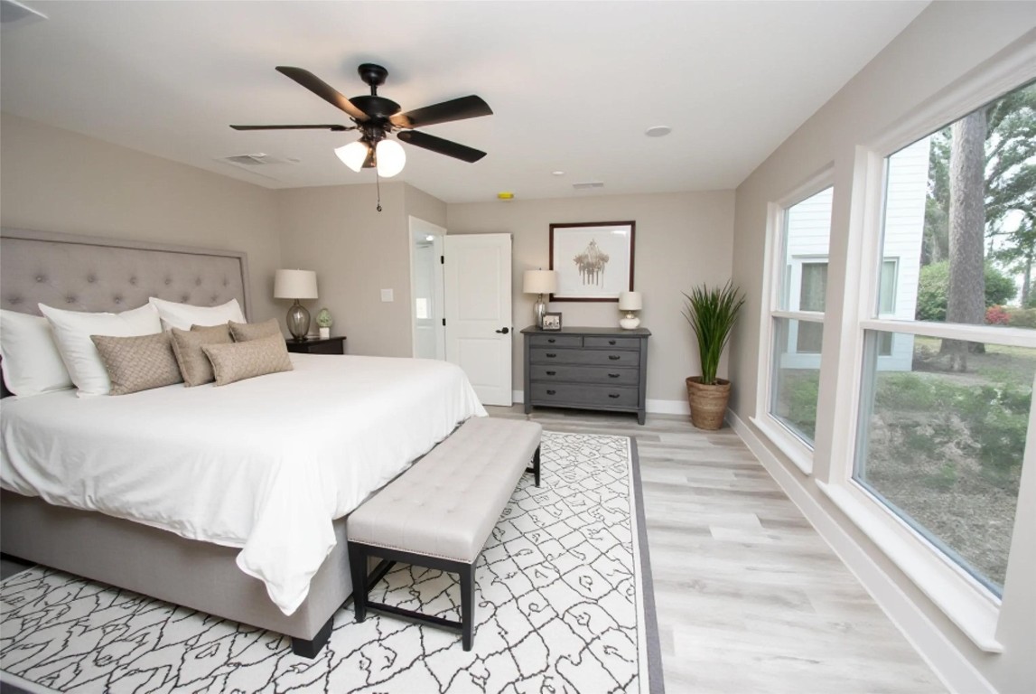 3322 Robinson Road Missouri City, TX 77459 - Photo 13 of 27 a bed room with a bed and a large window