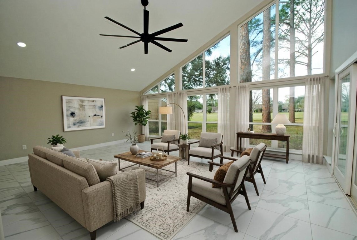 3322 Robinson Road Missouri City, TX 77459 - Photo 19 of 27 a living room with furniture and a large window