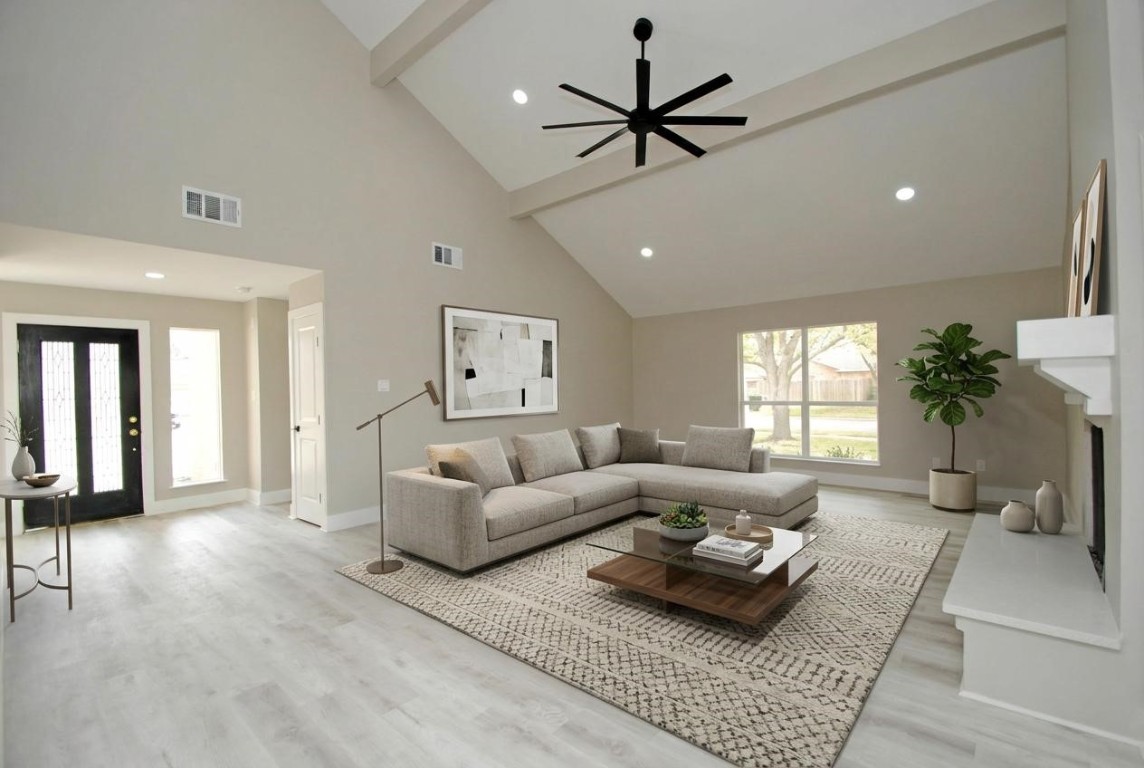 3322 Robinson Road Missouri City, TX 77459 - Photo 2 of 27 a living room with furniture and a large window