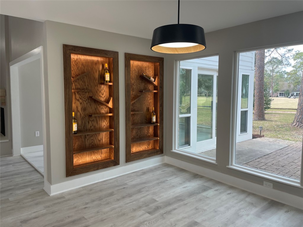 3322 Robinson Road Missouri City, TX 77459 - Photo 26 of 27 a view of a room with wooden floor and windows