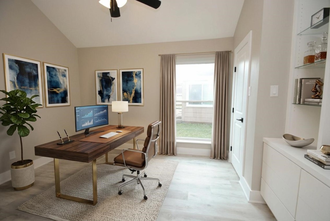 3322 Robinson Road Missouri City, TX 77459 - Photo 3 of 27 a view of a workspace with furniture and a window