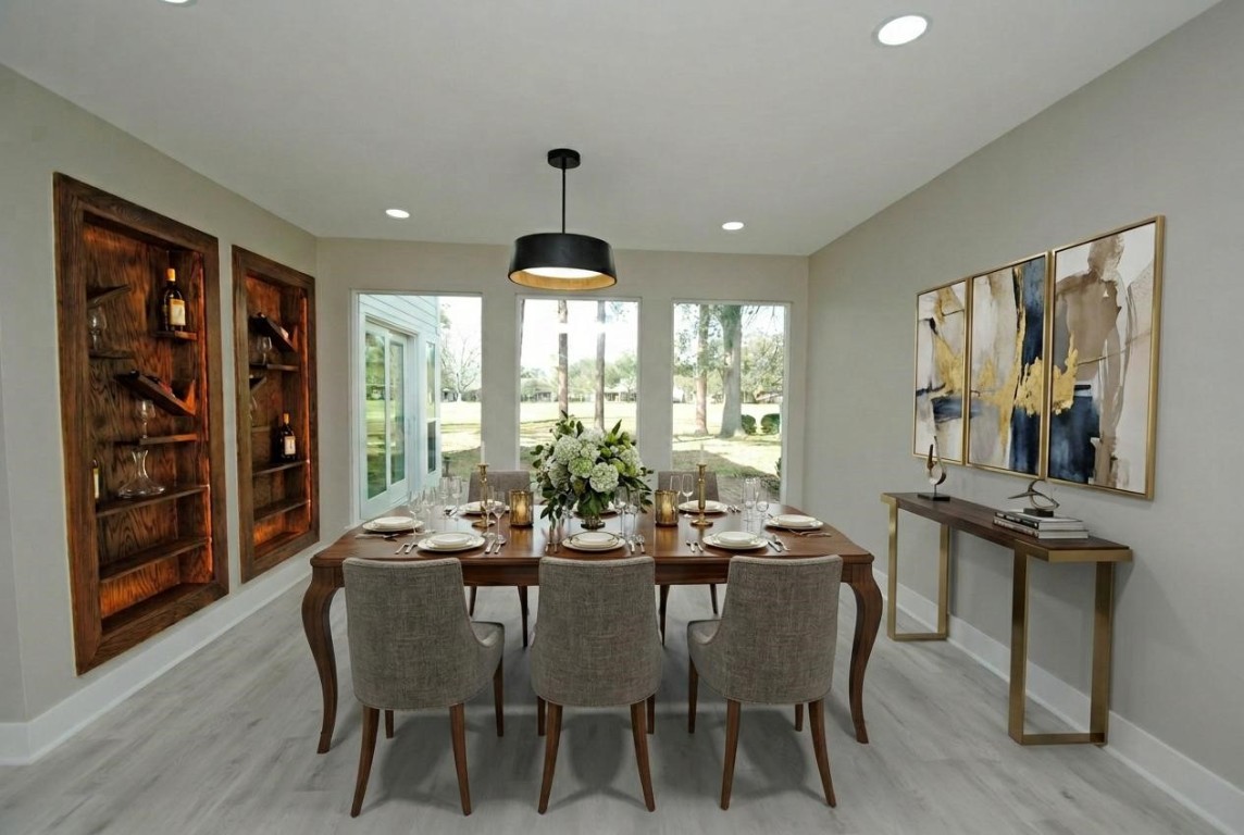 3322 Robinson Road Missouri City, TX 77459 - Photo 5 of 27 a view of a dining room with furniture window and wooden floor
