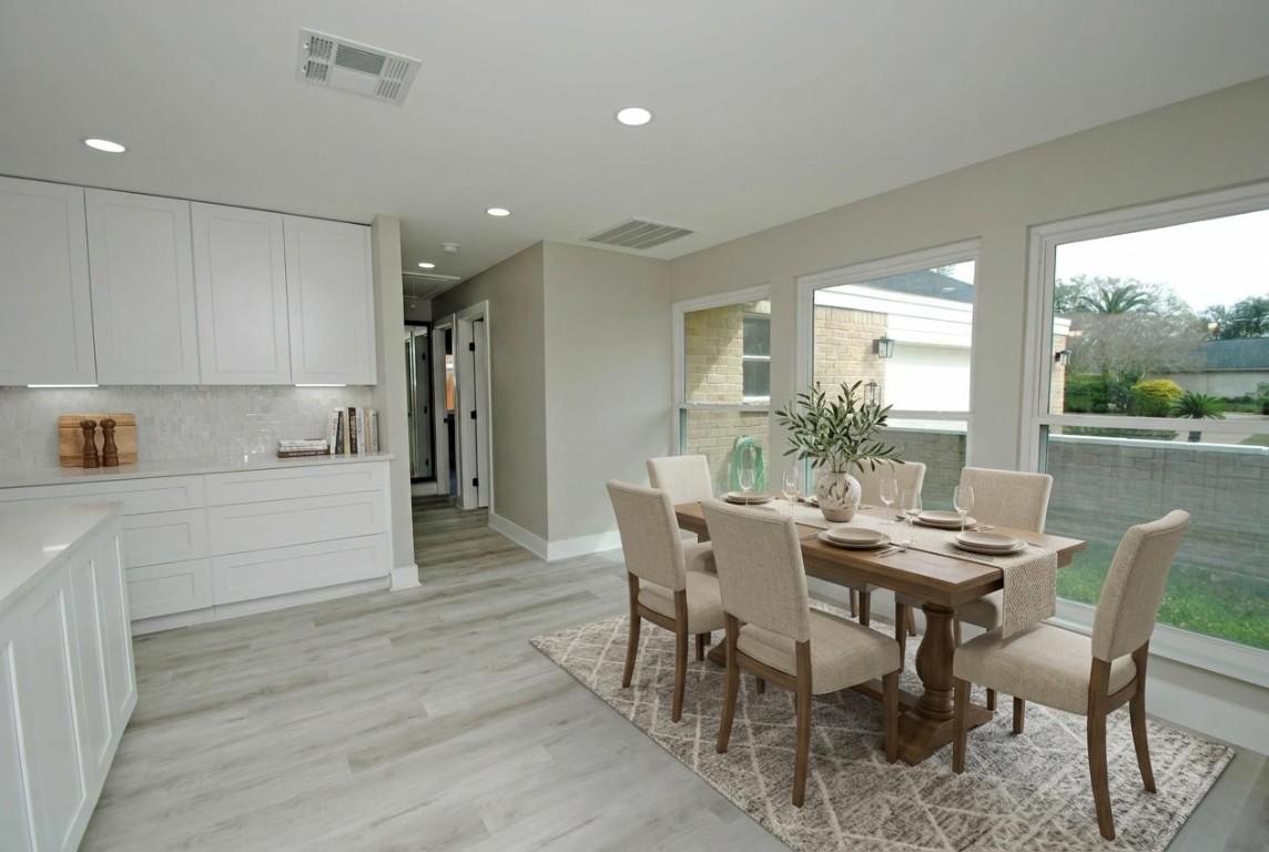 3322 Robinson Road Missouri City, TX 77459 - Photo 7 of 27 a view of a dining room with furniture window and outside view