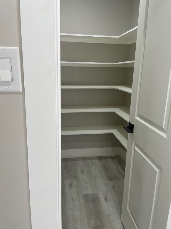 3322 Robinson Road Missouri City, TX 77459 - Photo 8 of 27 a view of walk in closet with empty racks