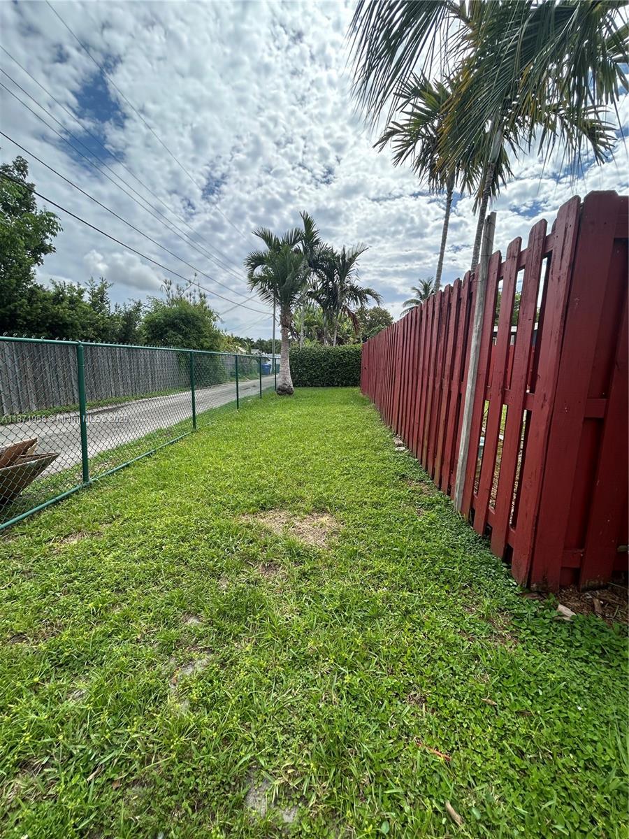 3219 Wilson Street Hollywood, FL 33021 - Photo 12 of 15 a view of a backyard with palm tree