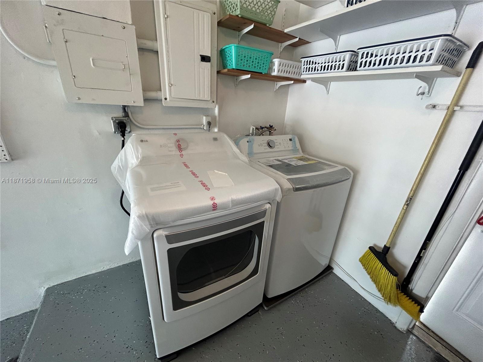 3219 Wilson Street Hollywood, FL 33021 - Photo 15 of 15 a utility room with dryer and washer