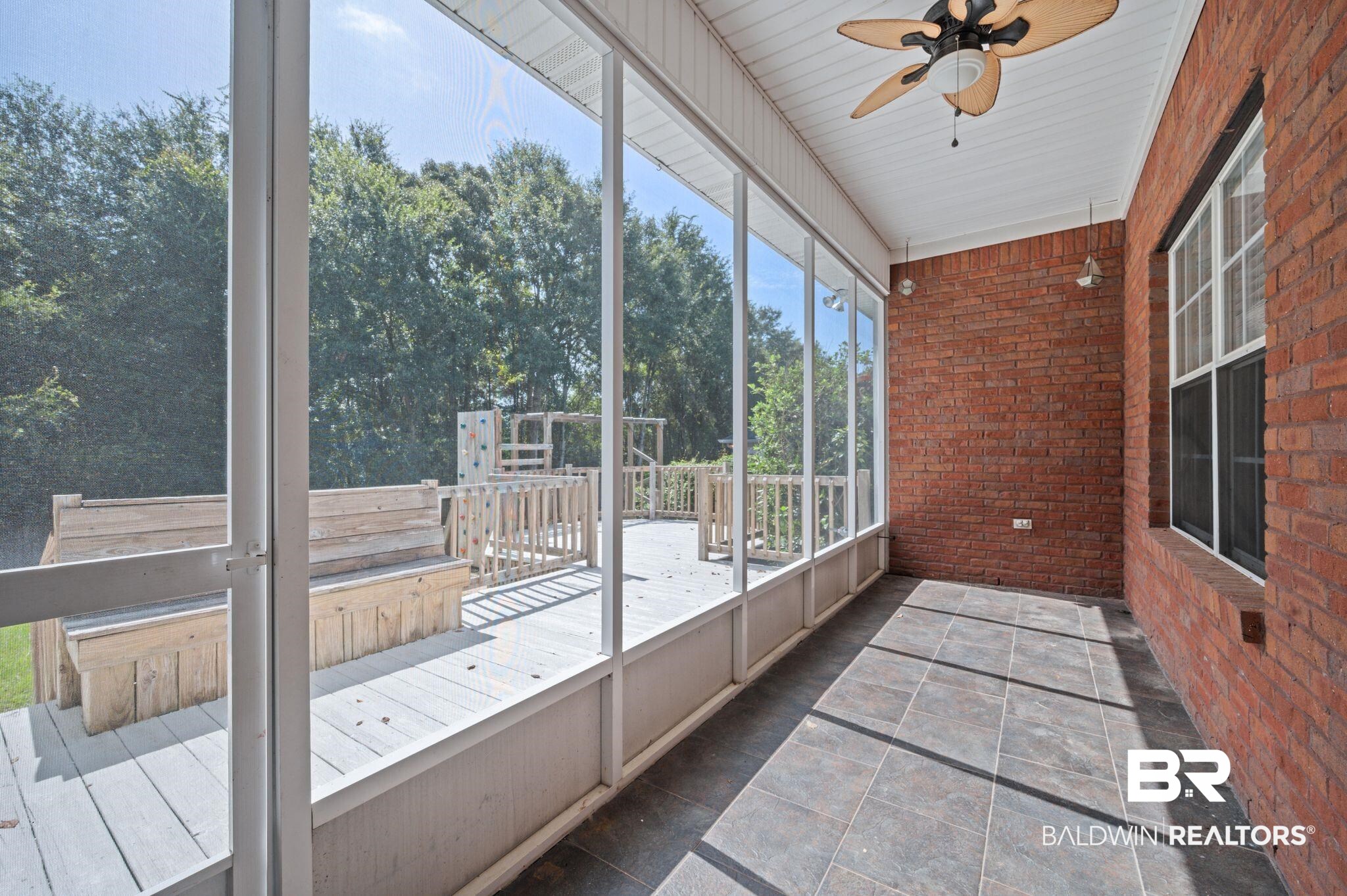 2041 Ridgeline Drive Mobile, AL 36695 - Photo 31 of 43 Unfurnished sunroom with a wealth of natural light and ceiling fan