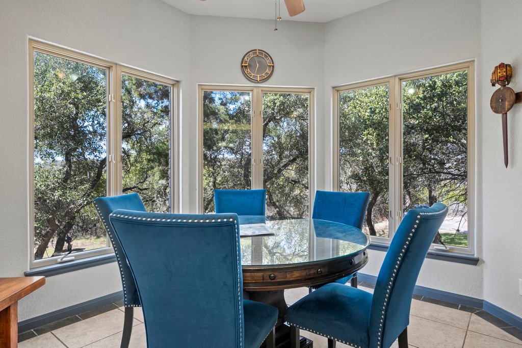 209 Lakeview Circle Spring Branch, TX 78070 - Photo 13 of 40 Sunroom / solarium featuring a ceiling fan