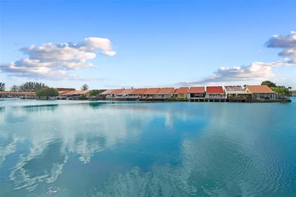 a view of a lake with houses