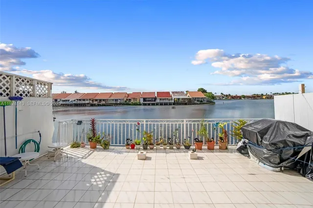 a view of a terrace with furniture