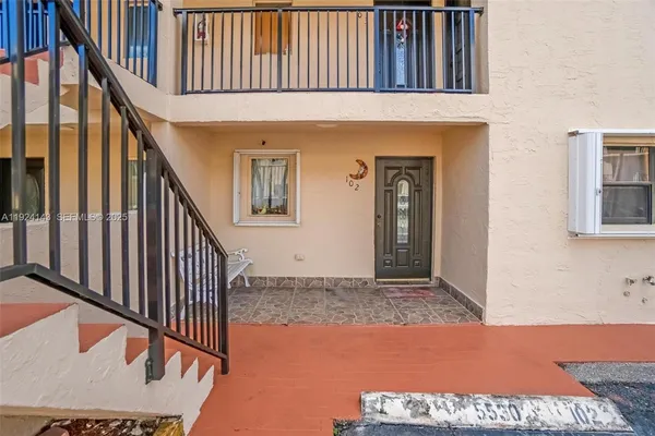 a view of an entryway with staircase