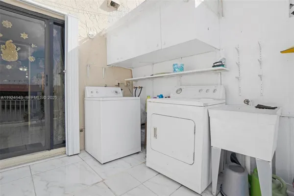 a view of a house with car parked