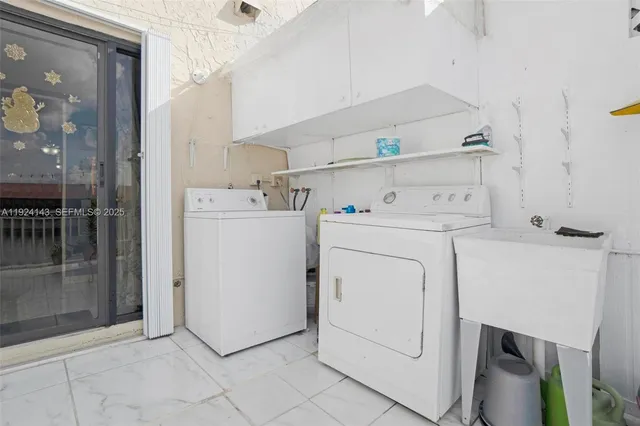 a view of a house with car parked