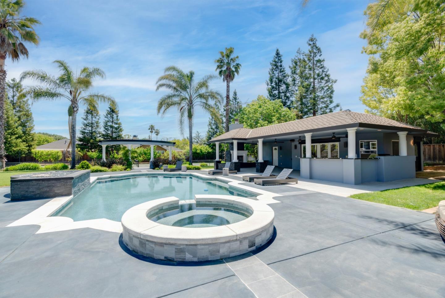 1940 Pear Drive Morgan Hill, CA 95037 - Photo 21 of 36 a view of a house with swimming pool and sitting area