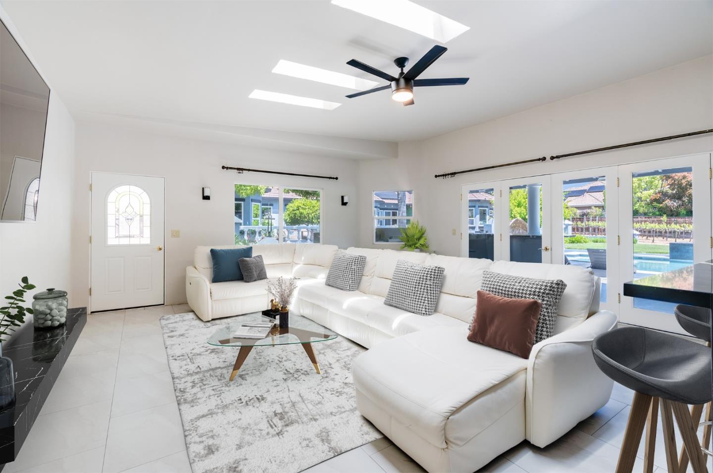 1940 Pear Drive Morgan Hill, CA 95037 - Photo 23 of 36 a living room with furniture and a large window