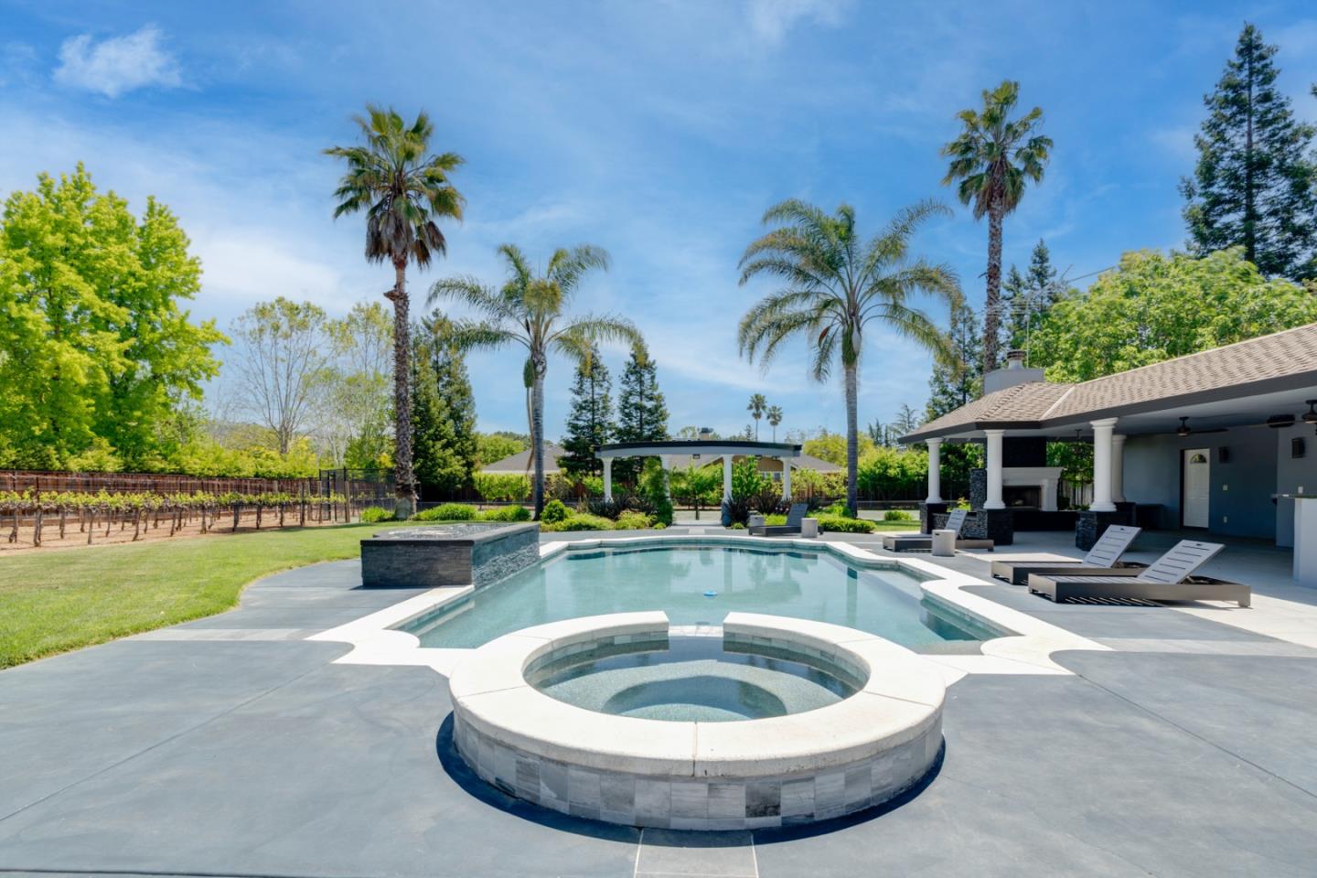 1940 Pear Drive Morgan Hill, CA 95037 - Photo 28 of 36 a view of a house with swimming pool and sitting area