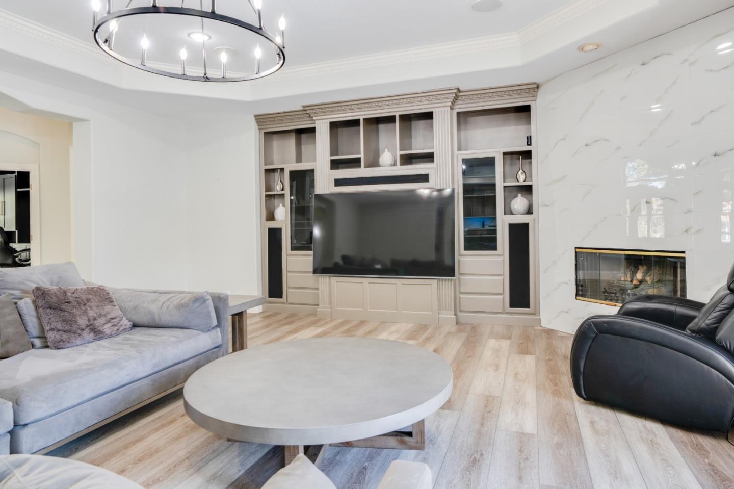 1940 Pear Drive Morgan Hill, CA 95037 - Photo 7 of 36 a living room with furniture and a flat screen tv