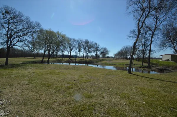 a view of park with trees